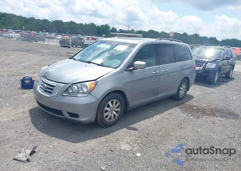 2010 Honda Odyssey Ex-L z USA, uszkodzony, nr VIN 5FNRL3H64AB107077